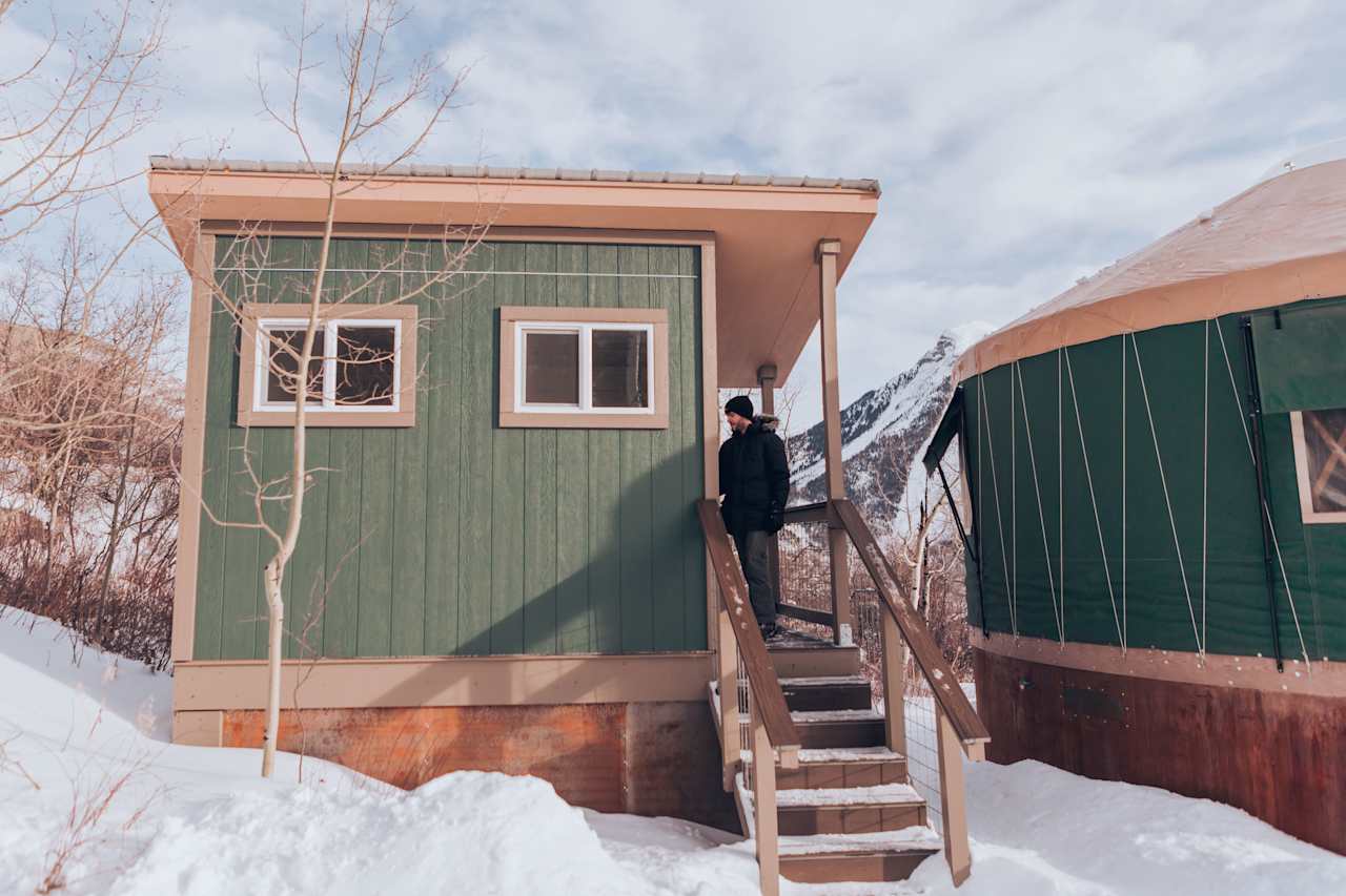 Entrance to the bathroom, just behind the yurt.