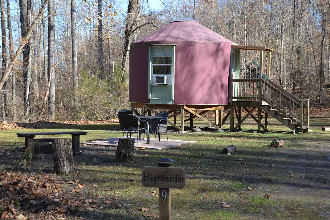 Grill/fire pit and outdoor and indoor table and chairs.