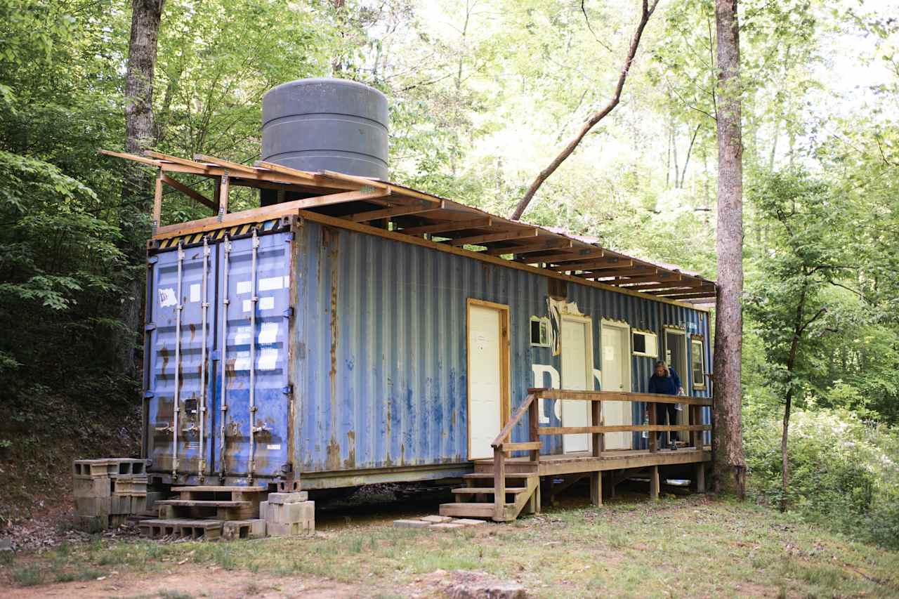 The bath house is just a short walk from each of the cabins. Showers are available!