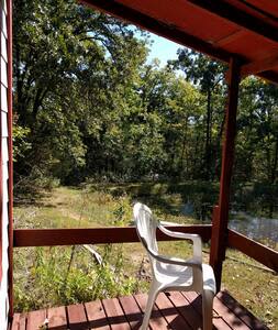 Sit on the deck and watch the life in and around the pond.