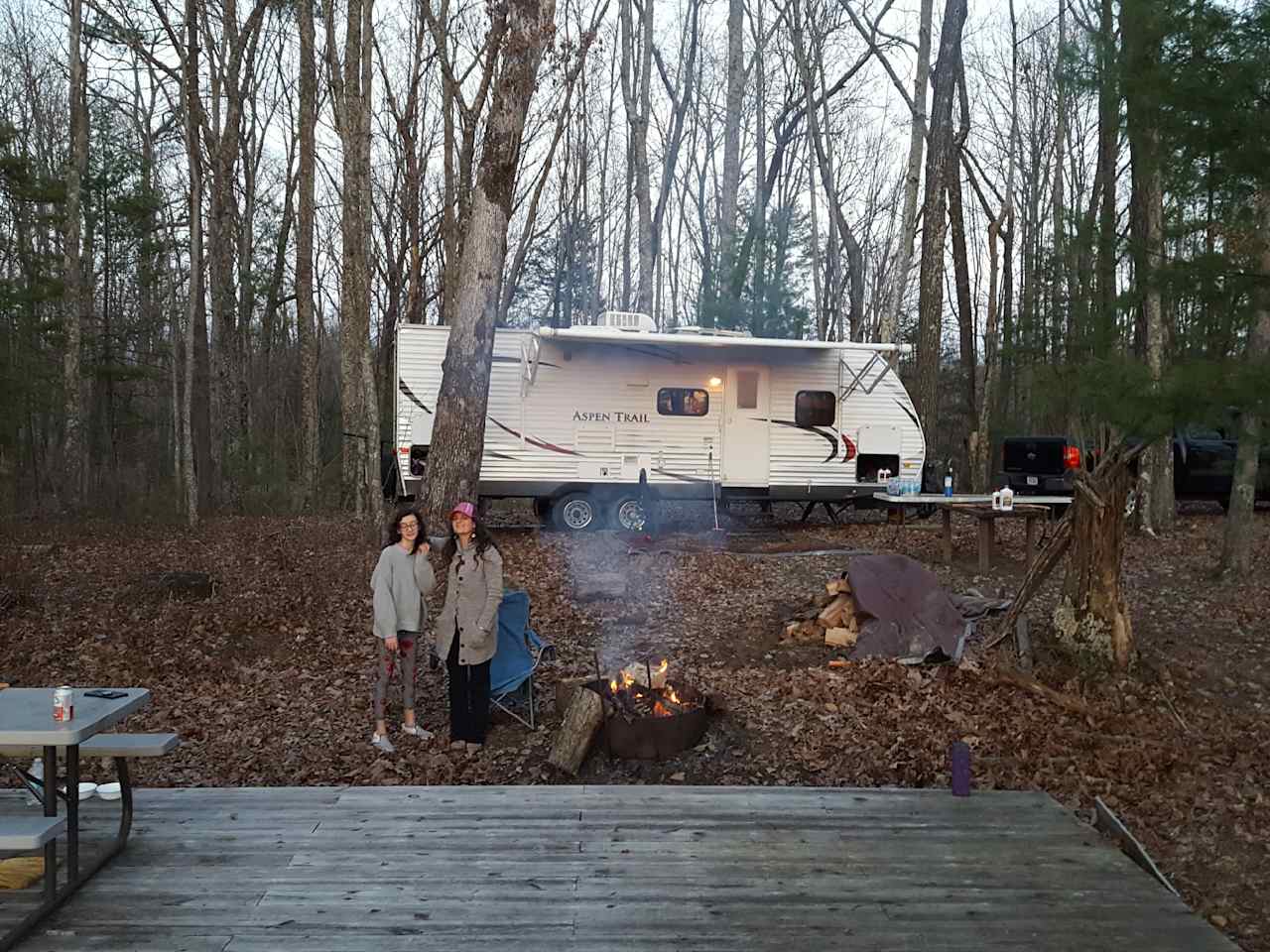 A view from the deck looking at the spot where we park our RV.  You can place your tent in this area if you want, or there are multiple flat areas around the this spot for your tent.