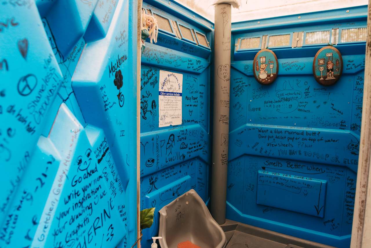 There's a portapotty outside, where writing is encouraged.