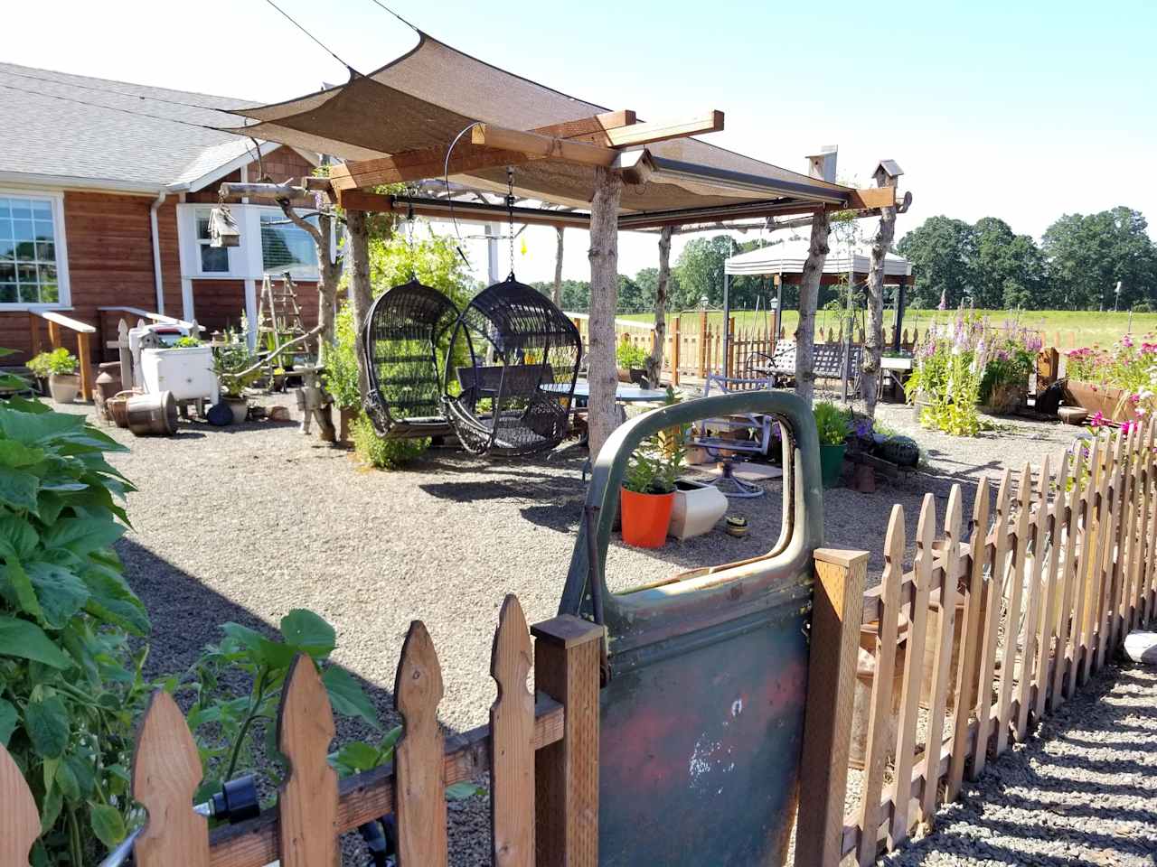 Basket swings in flower garden