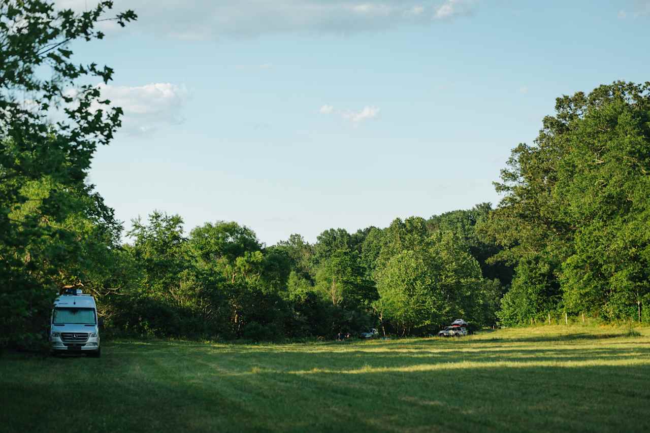 Lots of places for camper vans and tents along a small creek.