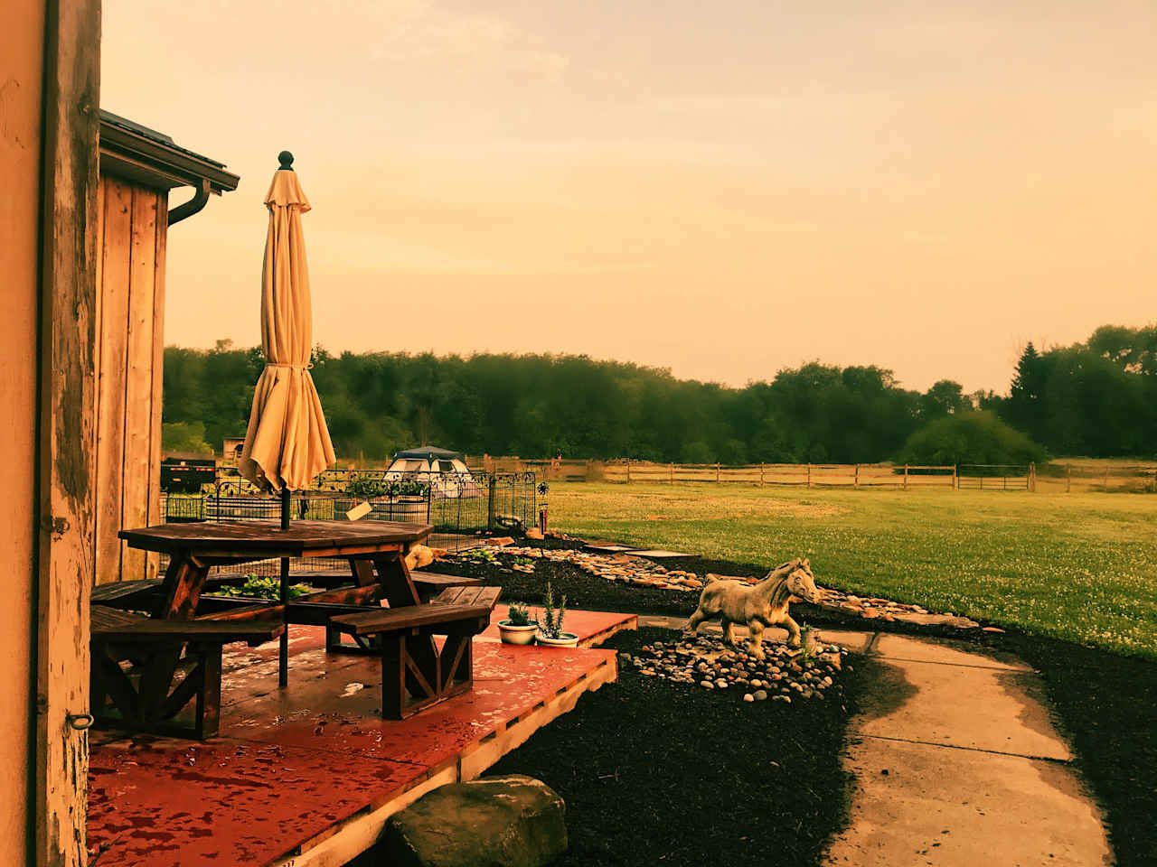Dusk under Ōne Sun 
View from RidingQuest Stables.  Don’t have a tent, camper or RV, stay in a dry glampers rustic 12x12 stall. Amazing experience to sleep in the stables. 