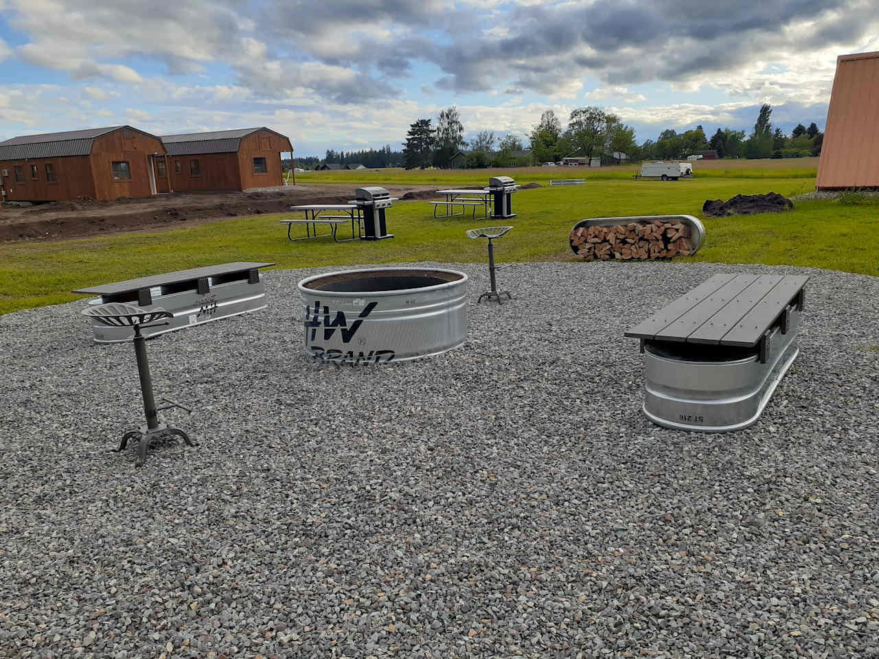 Firepit, gas grills, and picnic tables