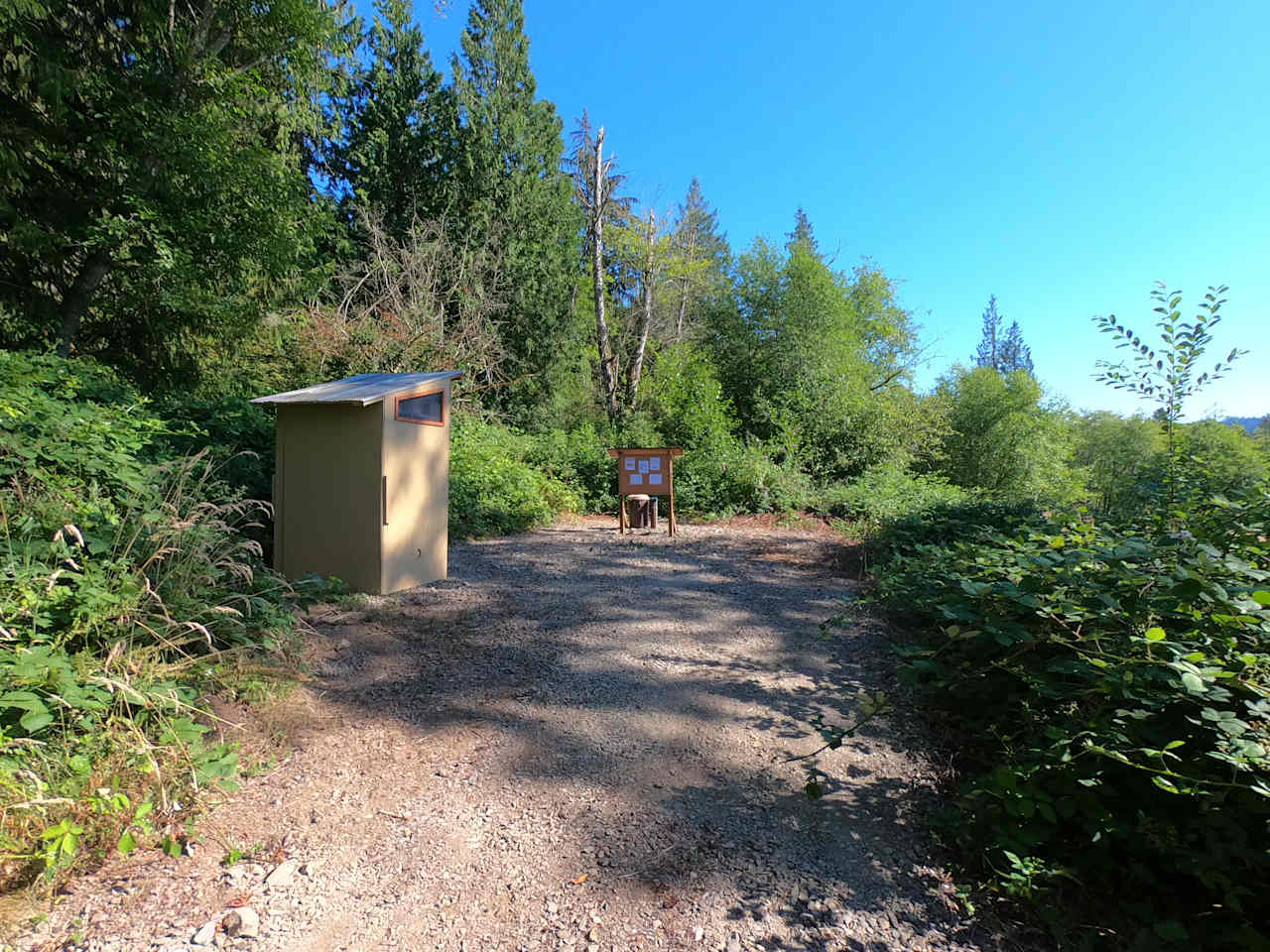 Parking area with composting toilet.