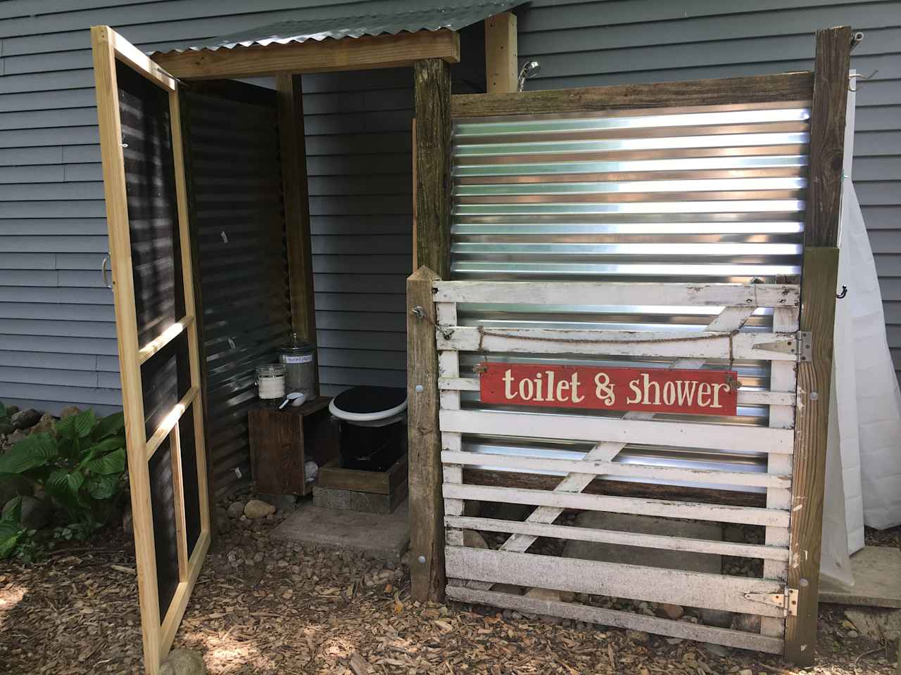 Our outdoor camping toilet and shower are easy to use with instructions posted for your convenience.