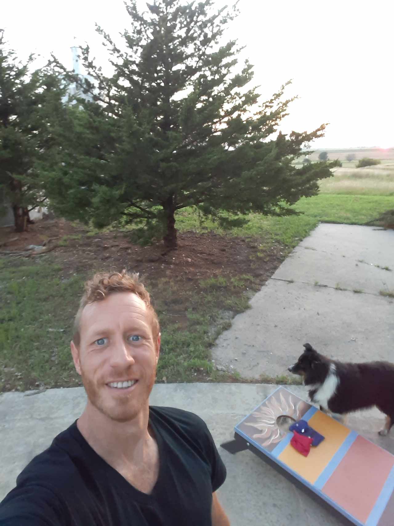 Your host Matthew with the Missile Silo Dog Buddy, playing Cornhole on the Missile Silo