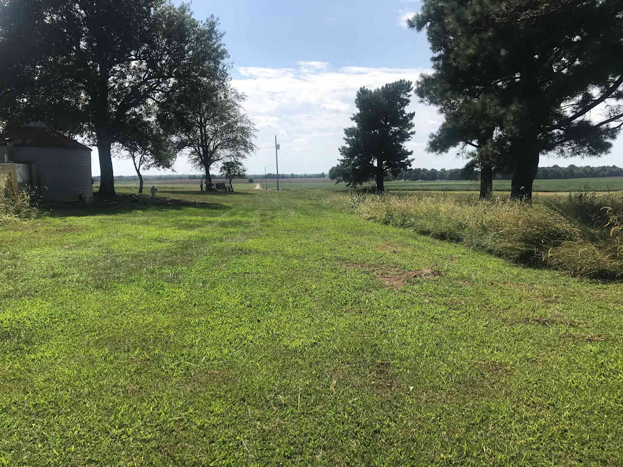 Parking area number 1. Next to a line of large pines, this area is shaded in the evenings and has a pretty view to the west.