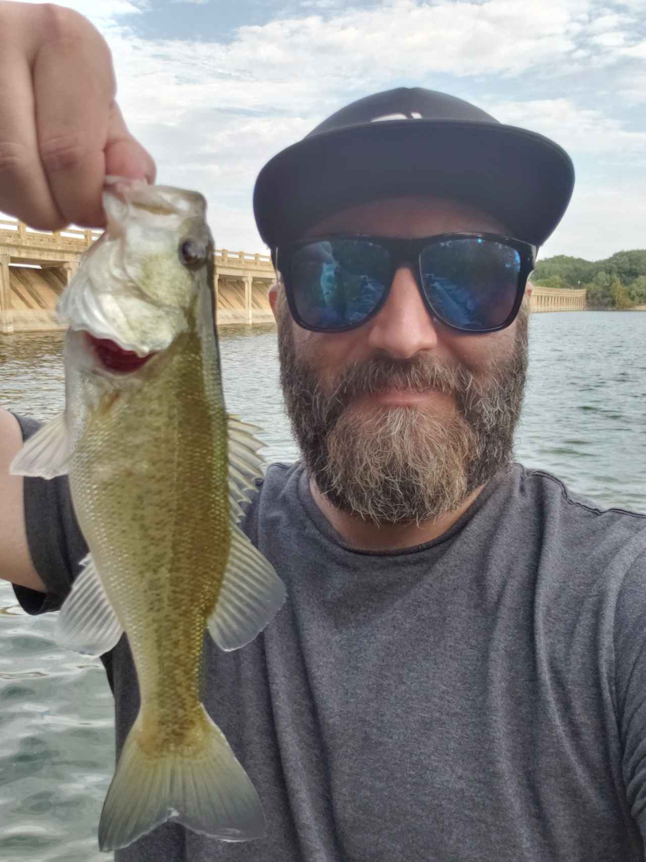 Bass hitting crankbait near the dam.