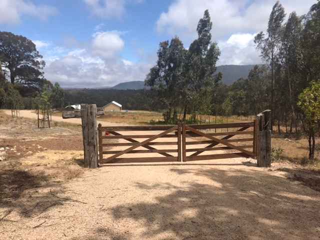 The front gate and entry to 'The Refinery', our farm where we produce organically grown garlic.