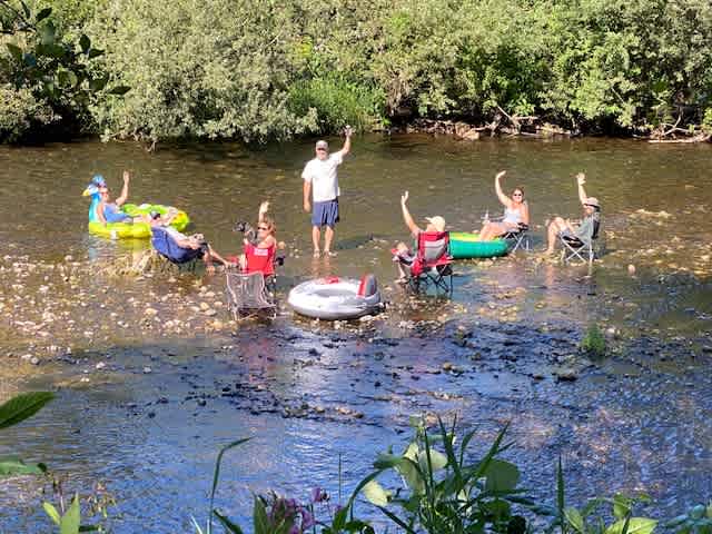 A hot August summer kept Hip-campers lounging in the river. all day