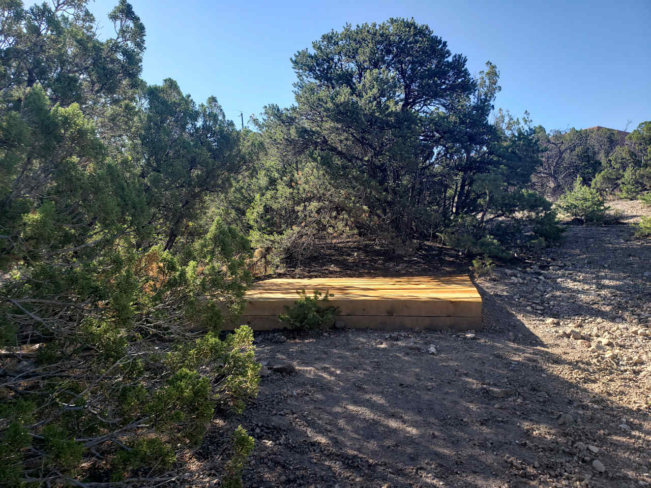 This is a raised platform for a future tent, but can be used with your own personal tent to get off the ground.