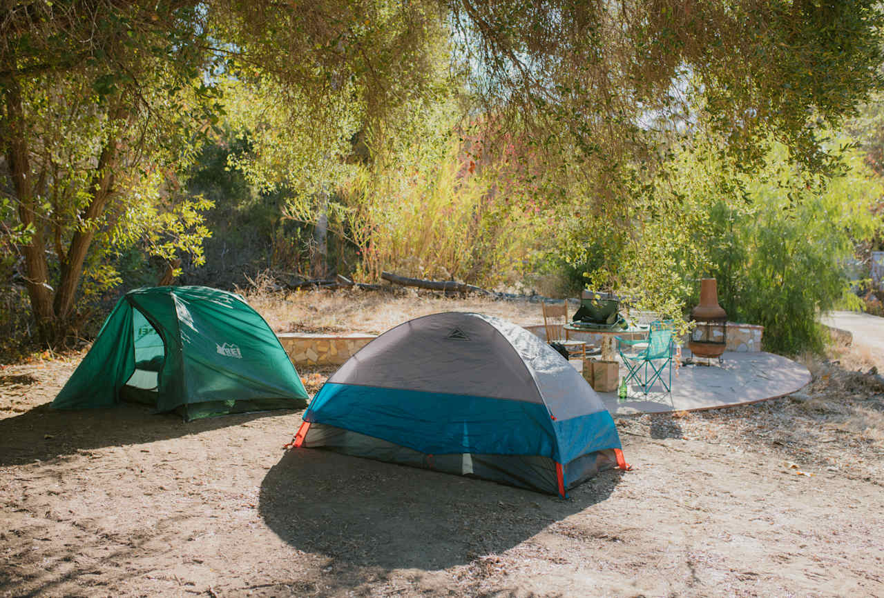 Our camp spot, nestled beneath the trees :)