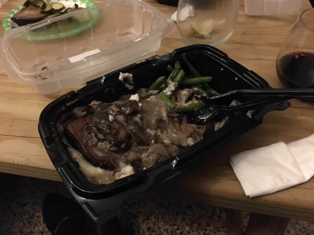 A very bad photo of a very delicious meal from their menu: beef short ribs with gravy, mushrooms, green beans, and mashed potatoes.