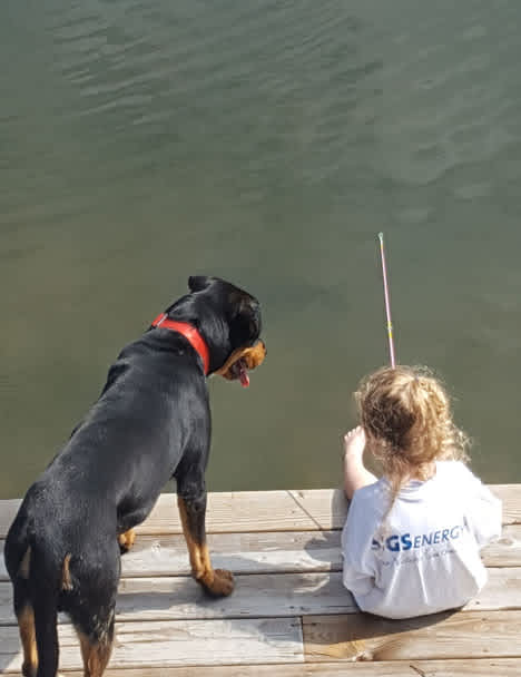 Fishing off of the deck at the log cabin.