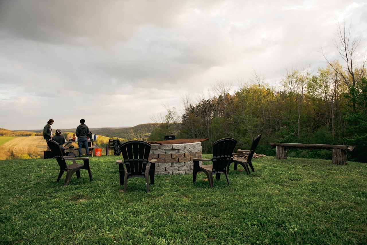 With a newly finished fire pit, seating and a picnic table, site 4 has the perfect set up for small groups!