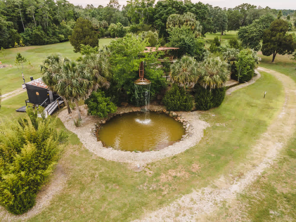 There's a beautiful waterfall at the front of the property