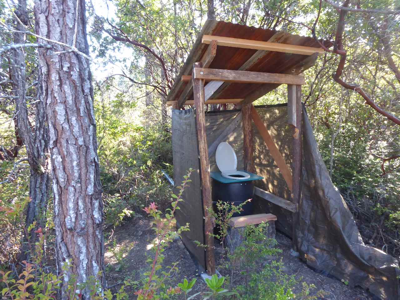 Outhouse with composting toilet