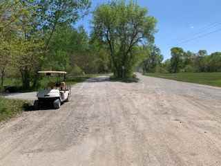 Start of private road.  Veer left at end of county road.