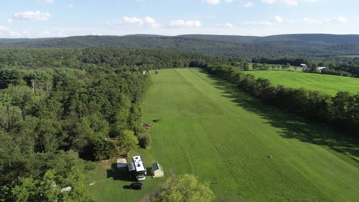 Showing 45' RV on site with multiple slide outs.