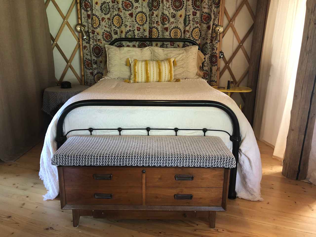 Main bedroom has privacy curtains which can be closed around the room.
8” gel foam mattress and comfy linens on an antique full size bed. Sleeps 2