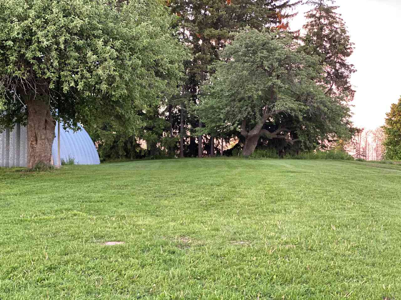 Big Apple campsite, beside Quonset shed