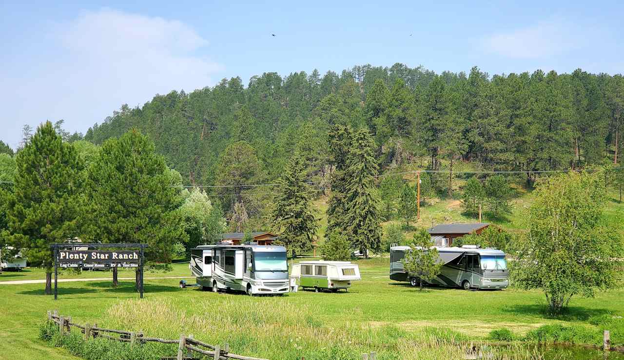 Partial RV sites, 50 - 30 - 50 amp, drive through, dump station just on the other side of the little driveway.