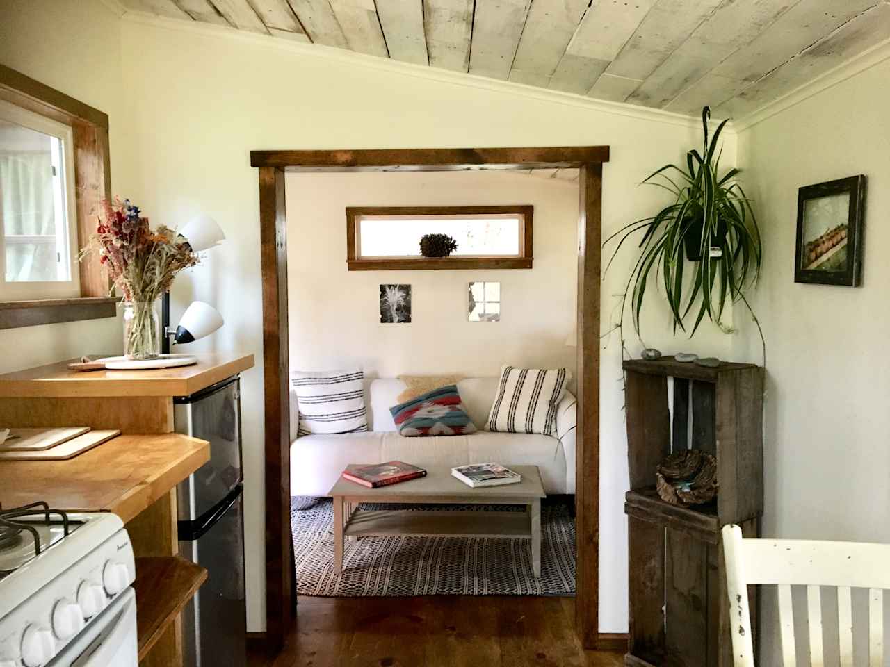 Looking from the front door through the kitchen into the living room/bedroom.