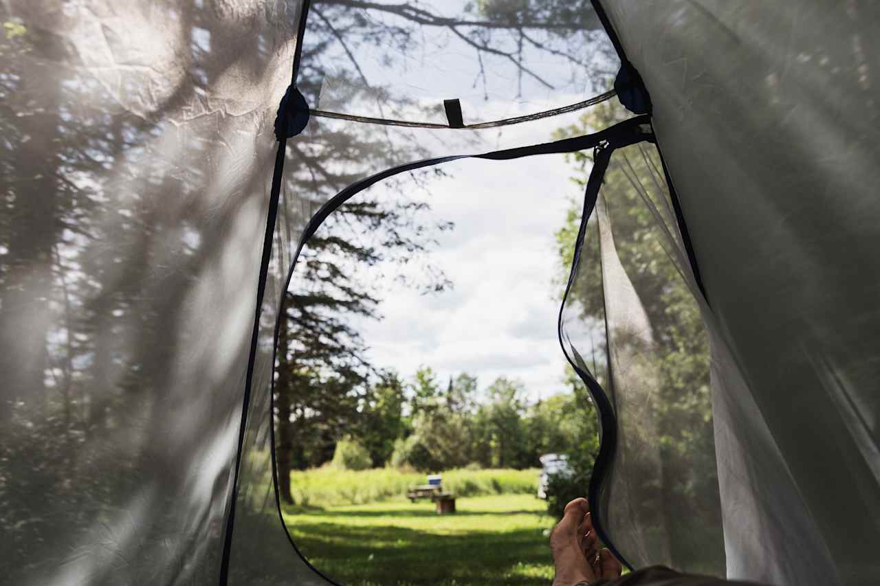 Relaxing in the tent, enjoying the breeze and sunshine. 