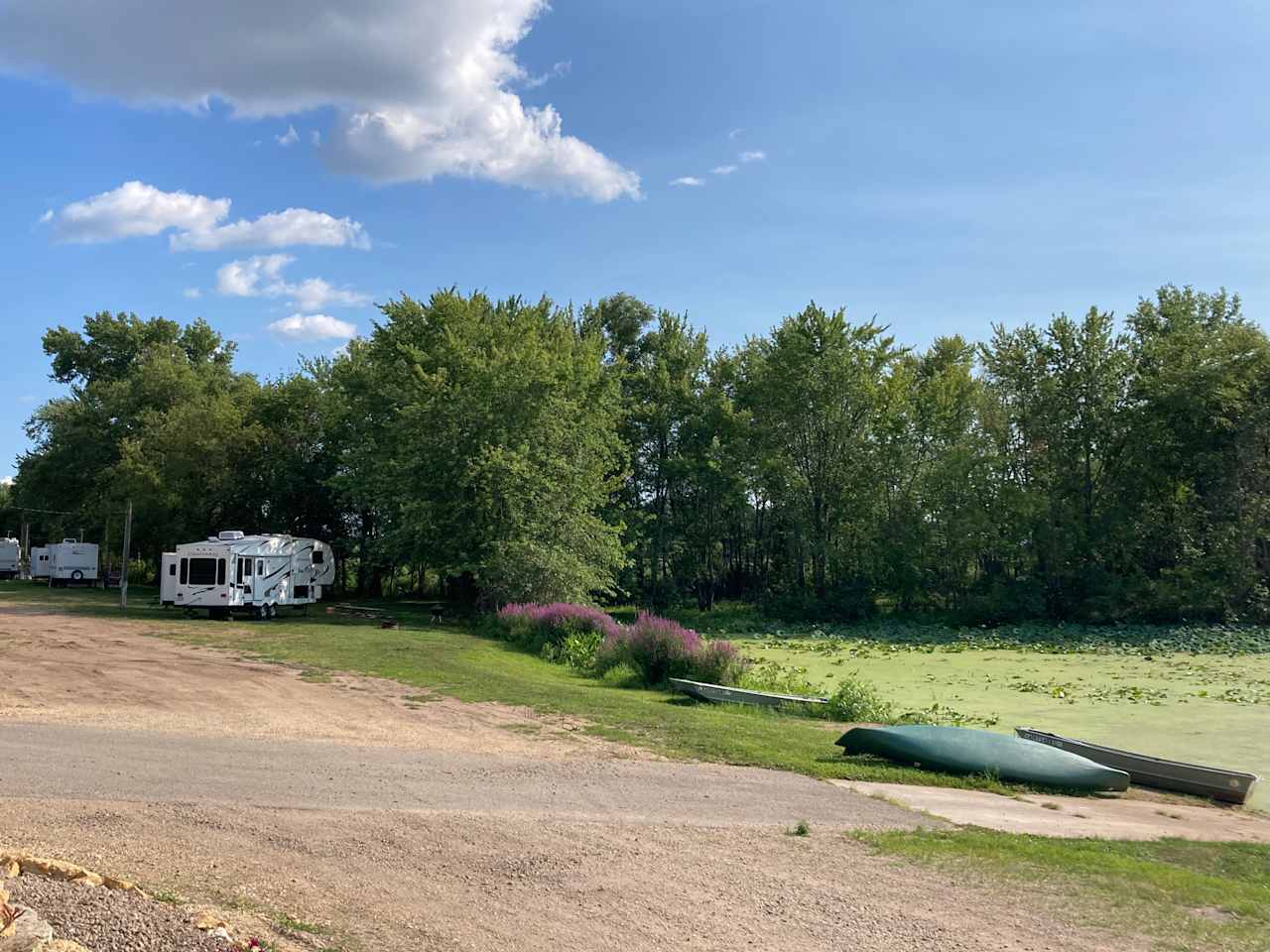 this photo shows where you will go to turn to the peninsula, lake boat launch on right, go past the RV and turn right after the power pole to enter peninsula road