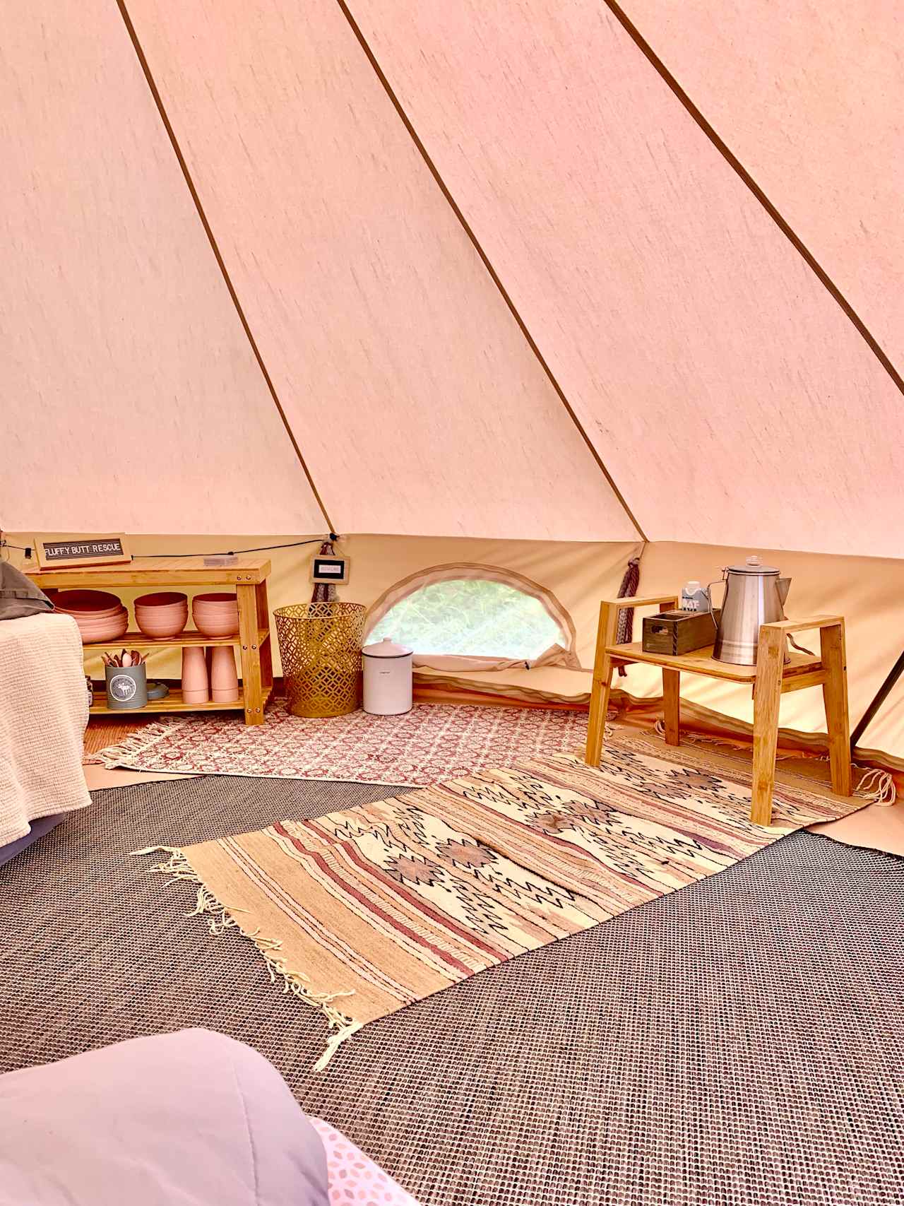 The tent is set up with a double-size bed and is spacious.  A twin size mat or crib mattress is available to accommodate additional guests.