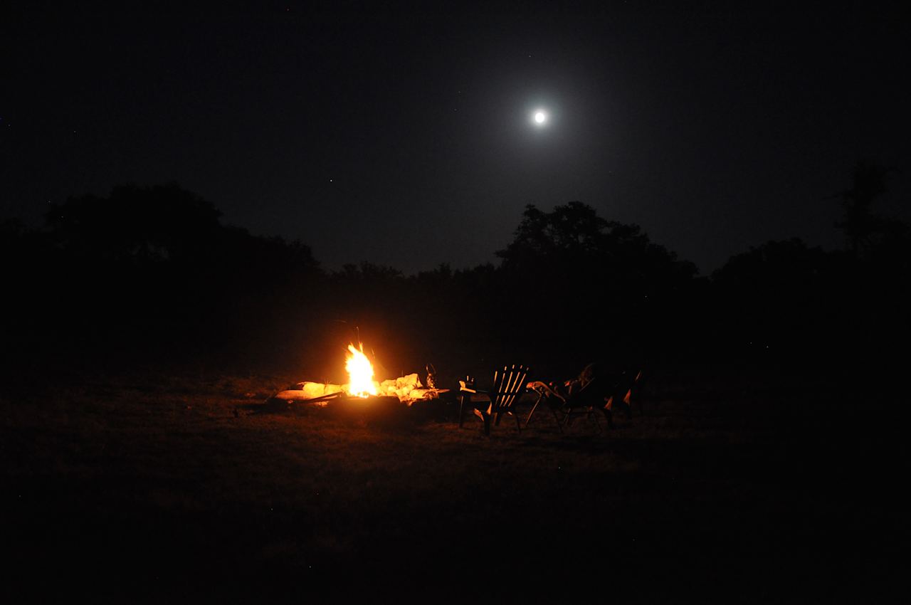 Full moon and campfire