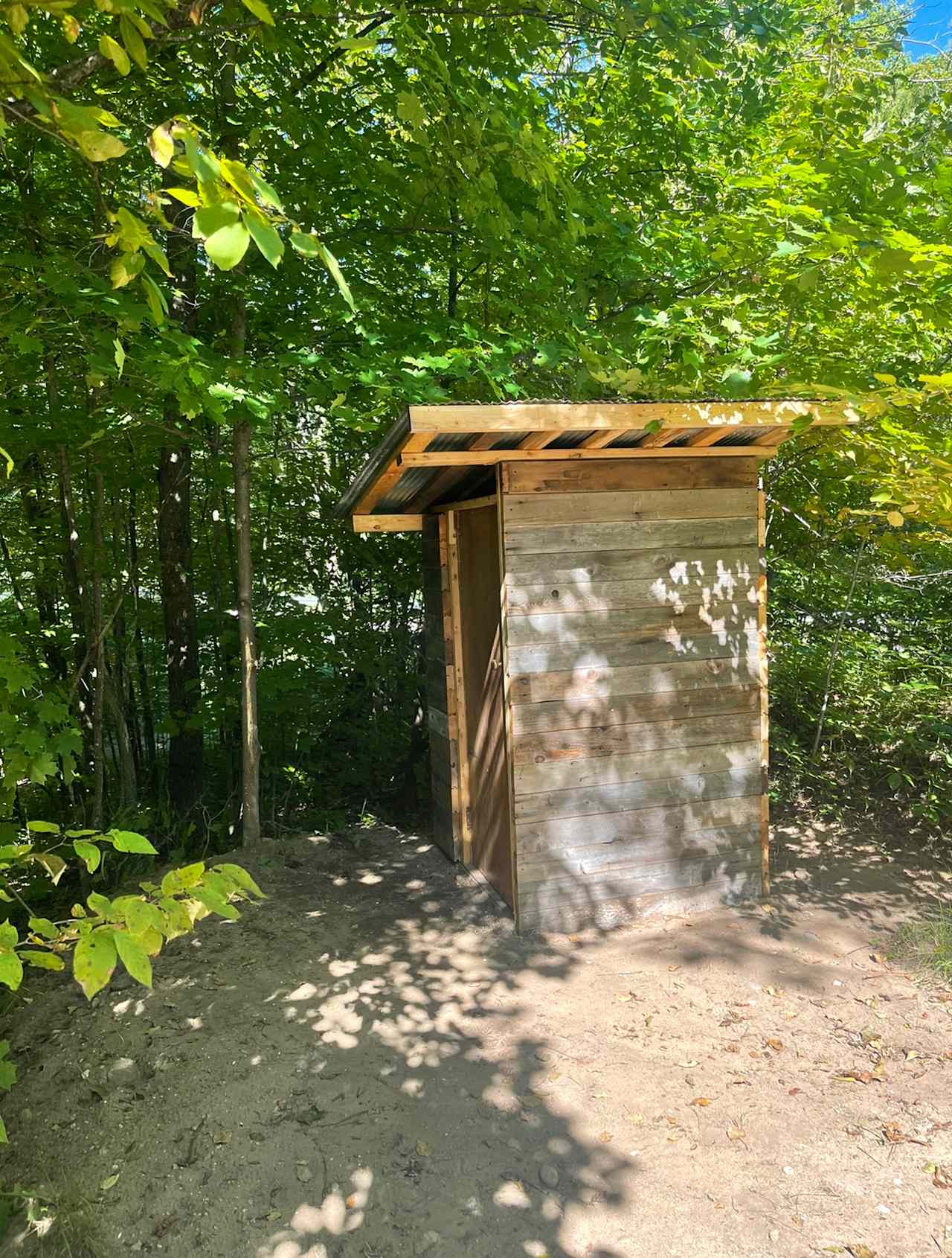 Outhouse. On the inside- latch style lock, motion detection light, TP and hand sanitizer station ;)

