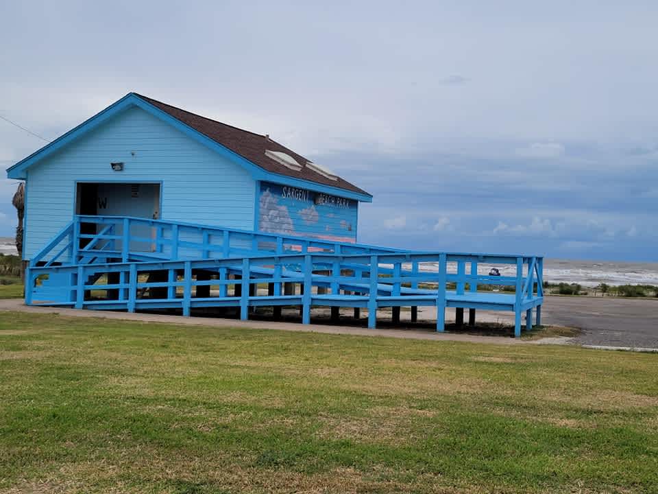 Sargent Beach Park has public restrooms. Located 1.5 mile from the site. 