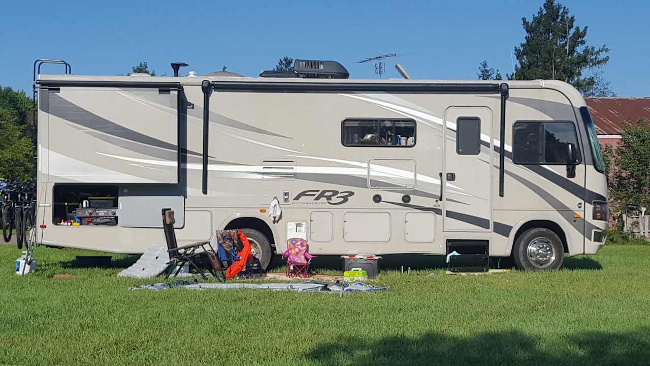 Camper at River Bank 1