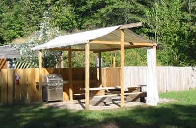 covered eating area in tipi village