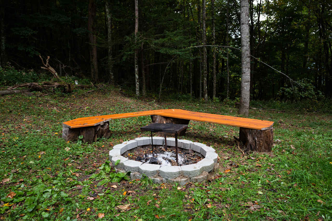 Campfire ring and bench.