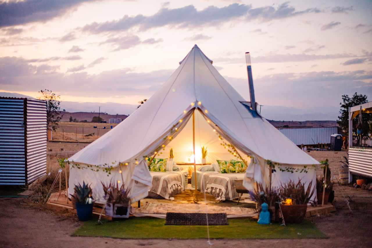 The yurt at sunset all lit up by solar power, it was a dream!