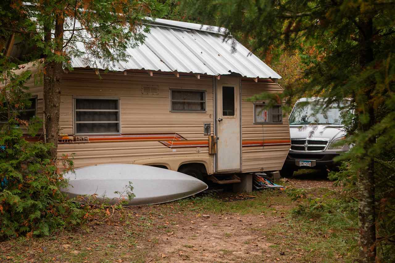 Here's a view from the open area looking back at the "parking area" / Entrance and the retro camper. 