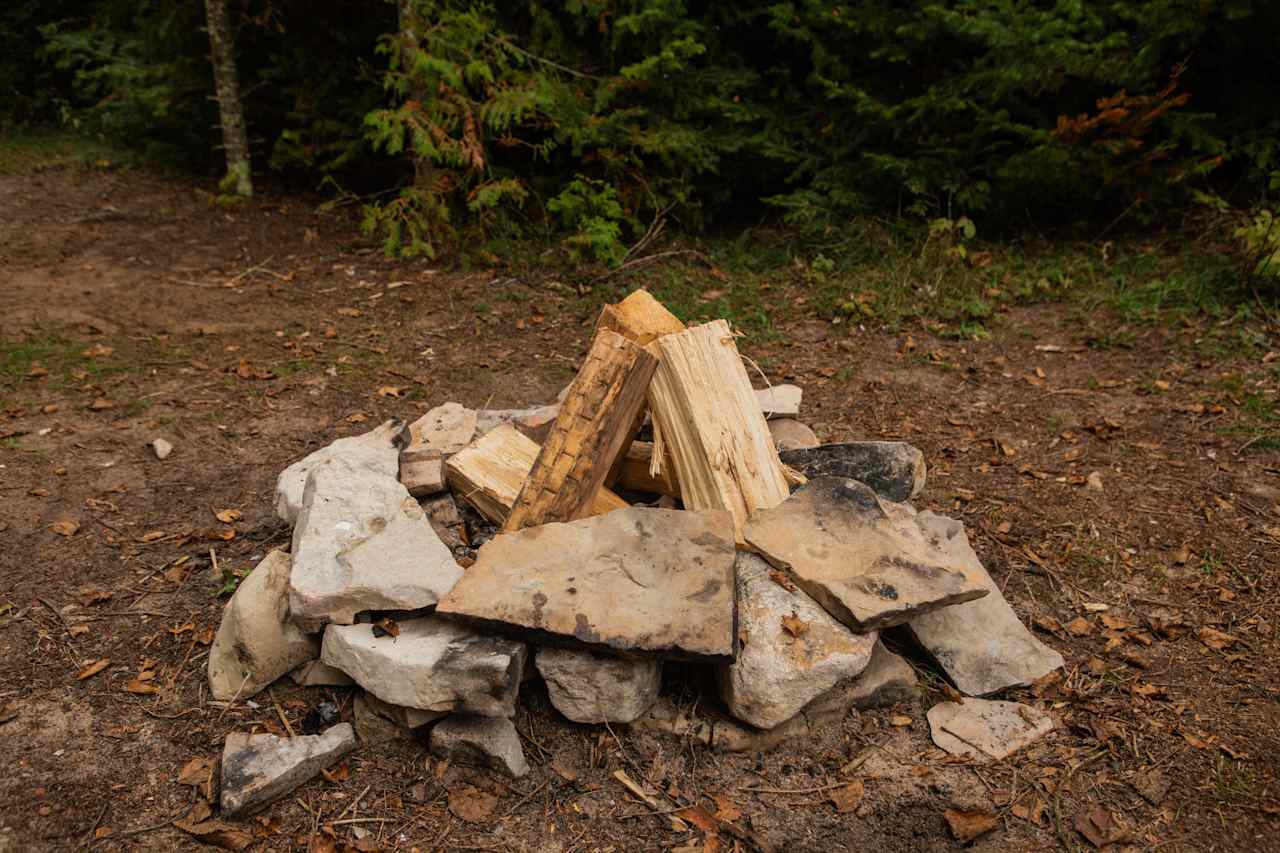 The firepit is made from stones. We brought our own firewood (sold at most gas stations in the area)