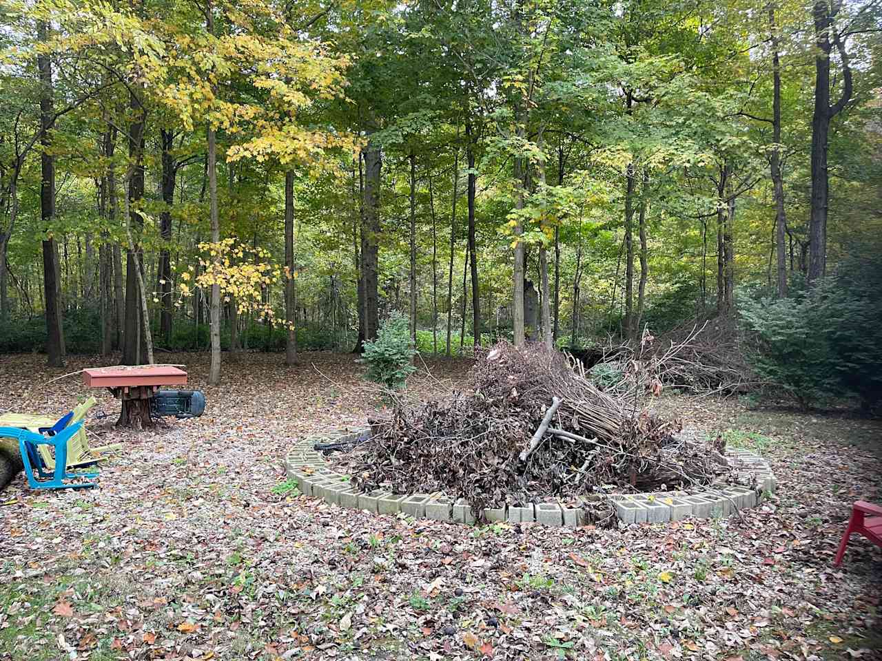 Bonfire pit with open camping behind 5-7 tents