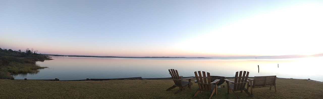 Sunrise at end of peninsula, fire bowl and seating available.