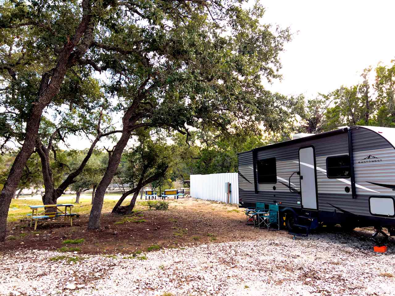 RV Site 1: Your cozy haven, complete with a welcoming picnic table and fire pit seating – the perfect recipe for outdoor memories. 🏕️🔥🍽️