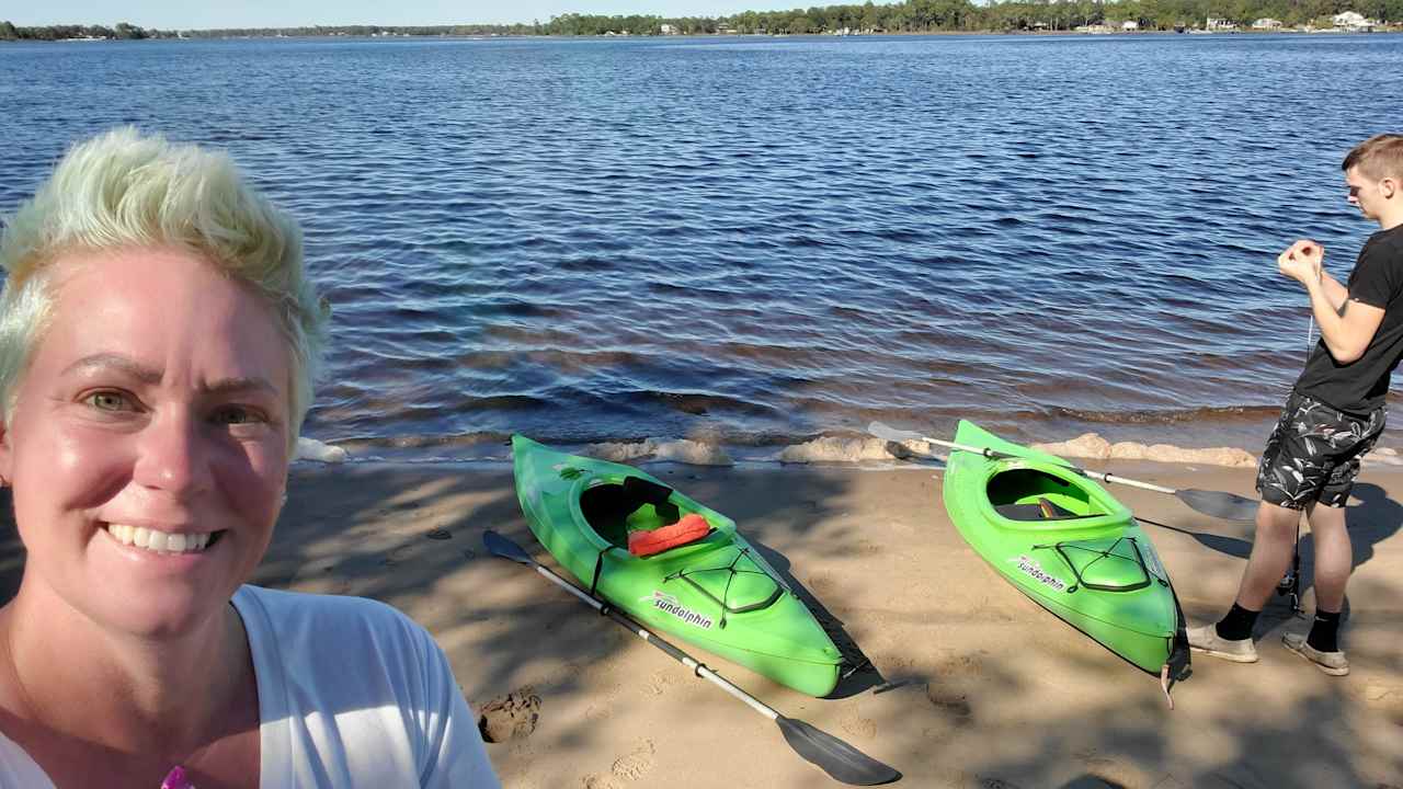 The sand is clean and very course, it's easy to wash off and nice to walk on. The water is mostly fresh water with a little salt. Water comes from a freshwater river. 