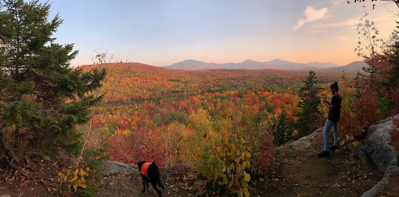 Presidential Mountain Range panoramic view from our private viewpoint trail in late September. Franconia Notch visible top right.