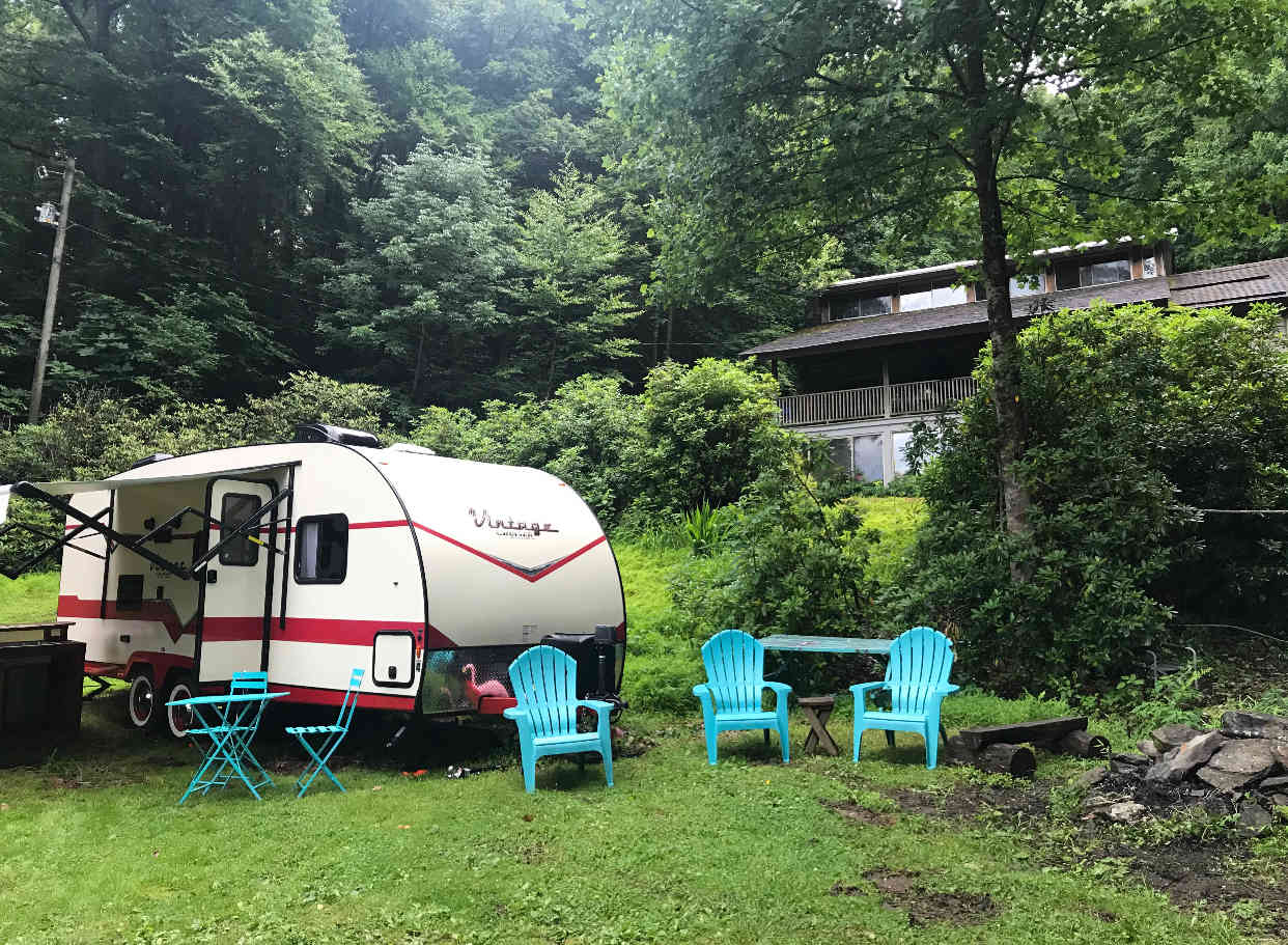 Camper and fire pit