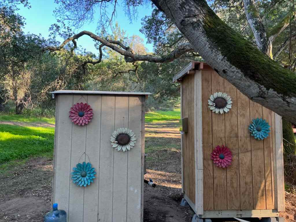 Back external wall of the water station and outhouse. 