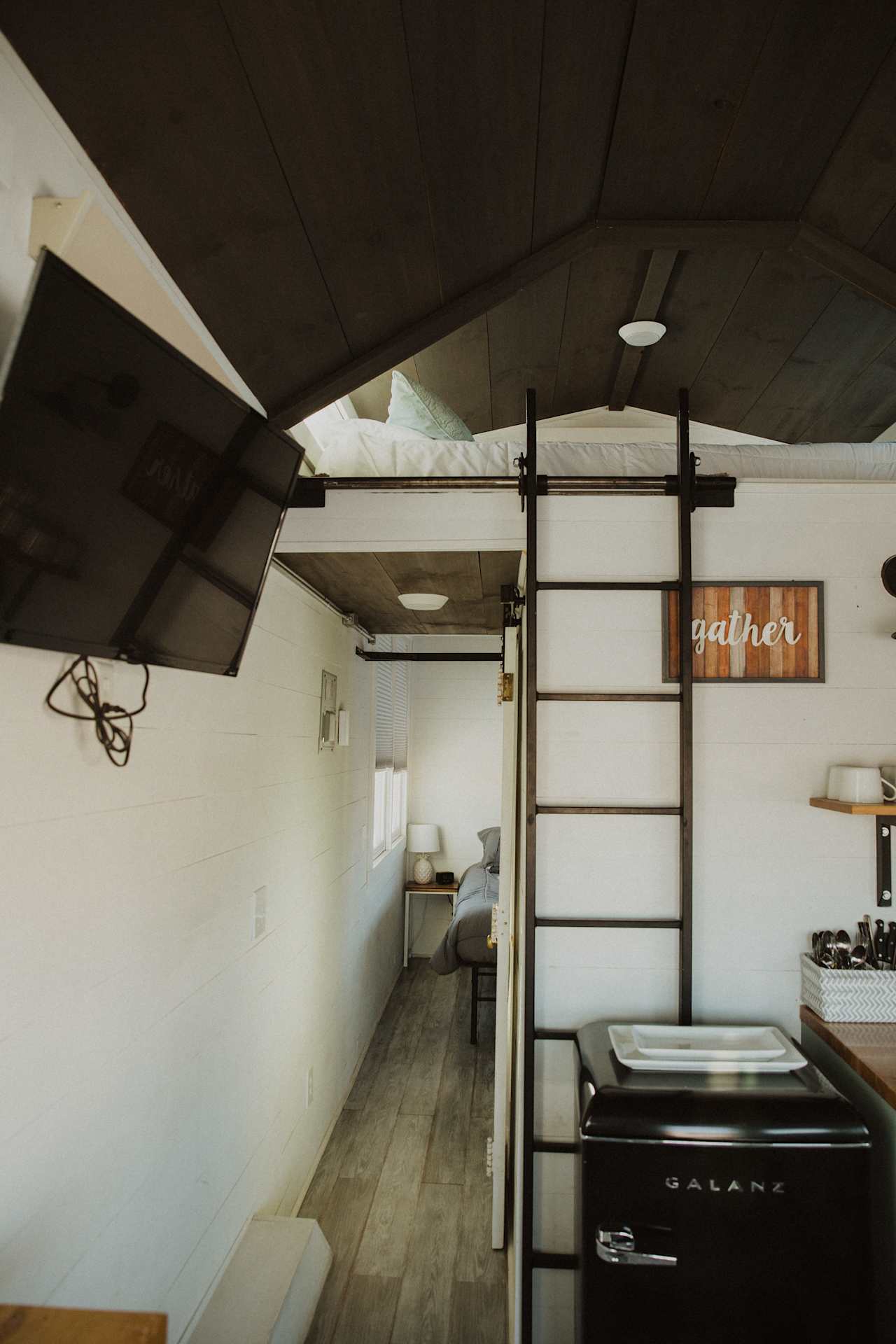 The ladder to the loft, one of two beds that sleep two. This house could comfortably sleep five people. 